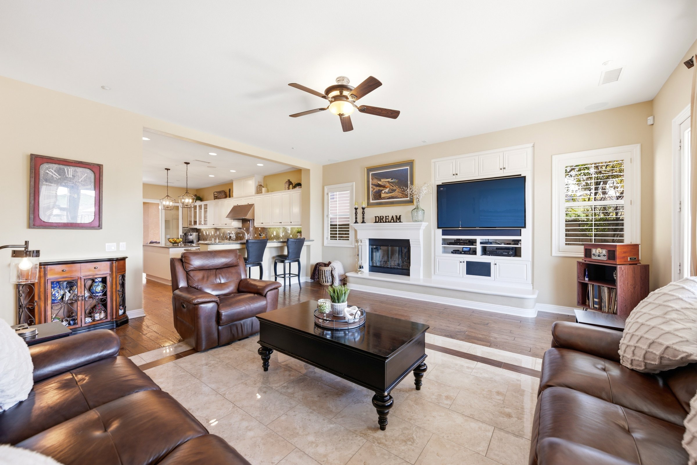 Family room with raised-hearth fireplace