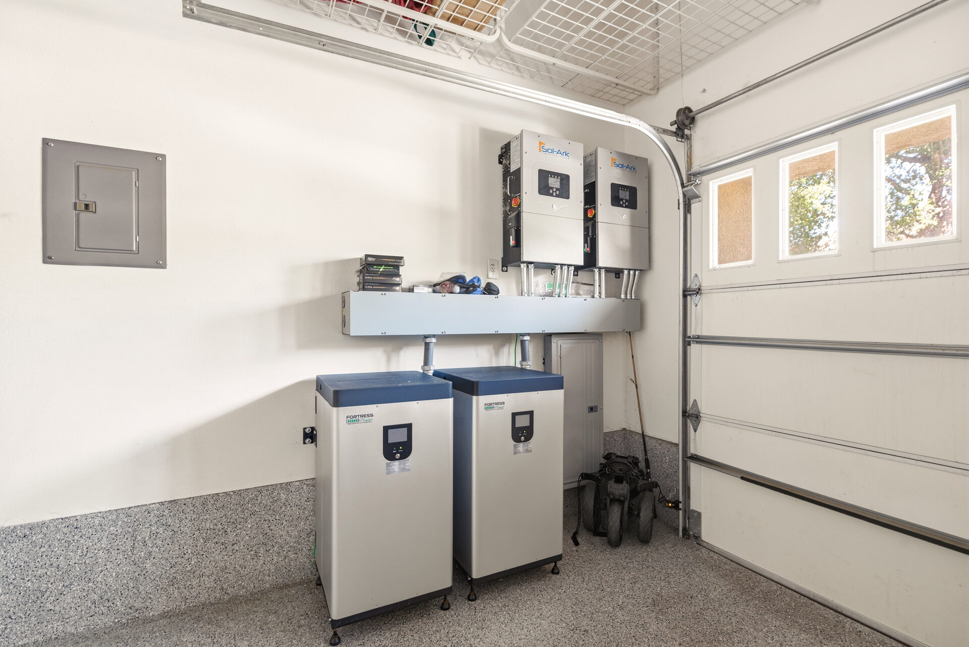Owned solar system with whole-house battery backup